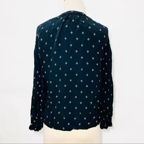 Something Navy  Easy Volume black geometric dot button up ruffle sleeve top