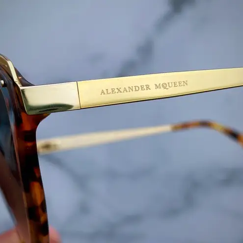 Alexander McQueen women’s AMQ 4241/S tortoise Havana gold cat-eye sunglasses
