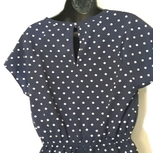 Valerie Bertinelli navy polka dot blouse