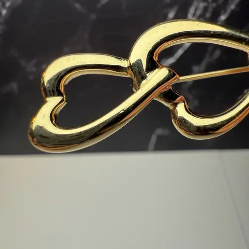 Monet Interlocking Hearts Shiny Gold Tone Brooch Pin Signed Vintage