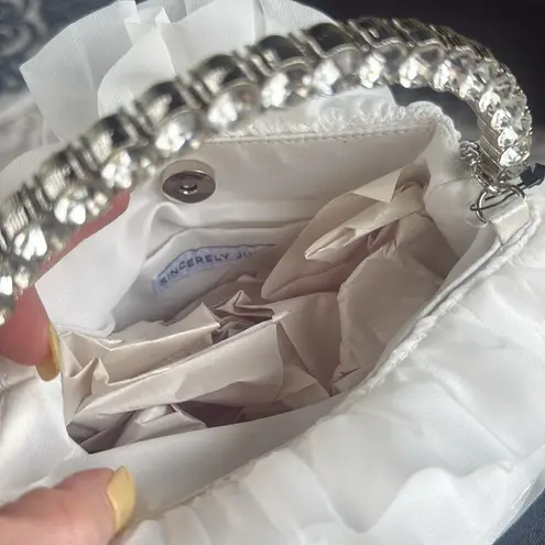 Sincerely Jules, silver rhinestone and white ruffled satchel