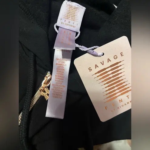 SAVAGE X FENTY FOREVER SAVAGE HOODED
ONESIE SIZE 4