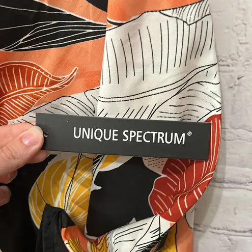 Unique spectrum NWT poncho style top