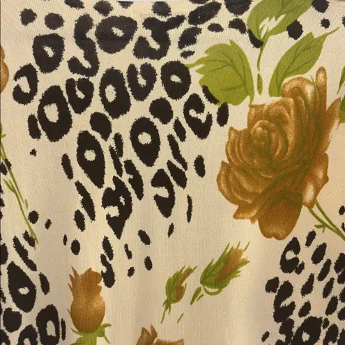 GOLD BLACK CREME COLORED TOP
STYLE DE PARIS BRAND ANIMAL PRINT FLOWERS W/ BLING Size L