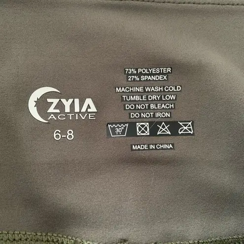 Zyia active logo crop leggings womans size 6/8 small medium olive green