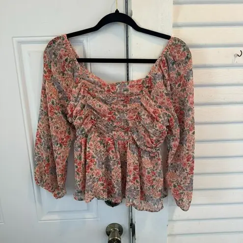 American Eagle pink multi floral smocked top size small