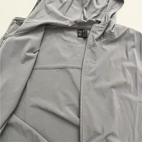 Zella  Grey Shade tunic Length Windbreaker with Zip Front, Hoodie and Pockets