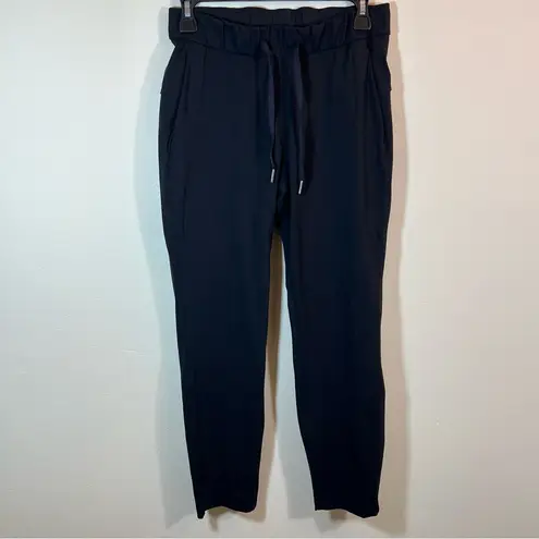 Lululemon  On The Fly Pants 27" Black Cropped Casual Lounge Women’s 4 thumbnail 2