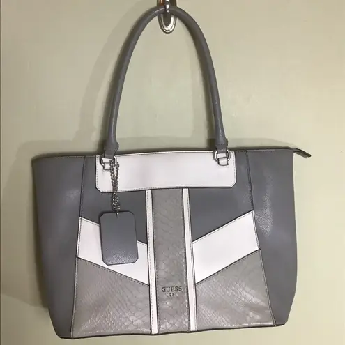 Guess  Women’s  Large Sized Tote with top handles EUC ( Flaw)