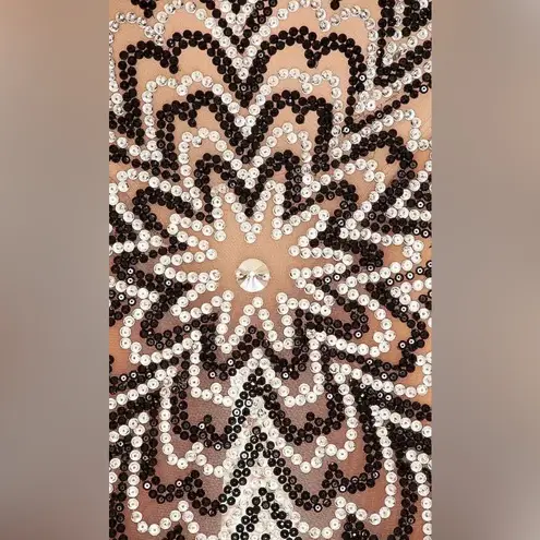 As seen in Bachelor Onalaja Farah Gown, size XS Tan