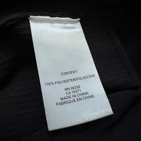 Tibi black ribbed button front sleeveless bodysuit