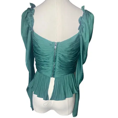 House of Harlow 1960 M
Emerald Green Ruched Peplum Top
Long Sleeve