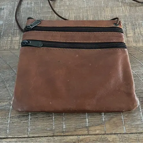 Vintage leather lightweight crossbody bag. Great for travel. Brown