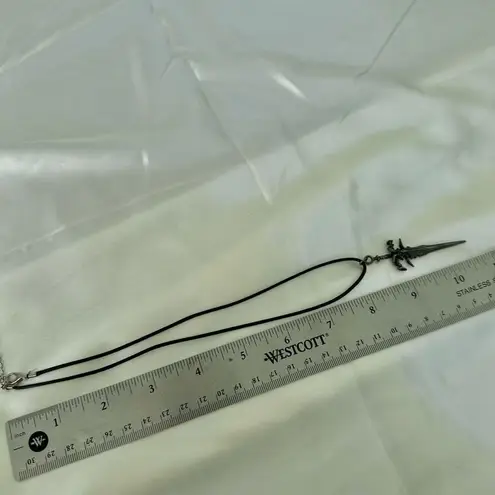 Silver tone sword necklace Gray