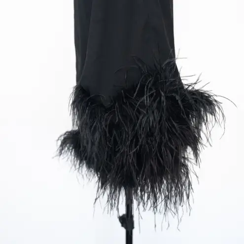 Betsy and Adam . Feather Trim Single Long Sleeve Cocktail Dress.