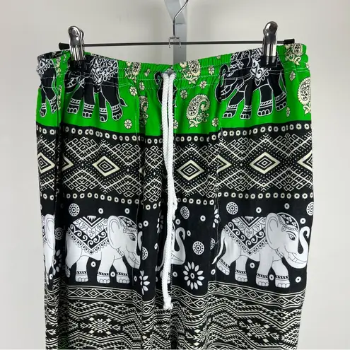 Thailand Made Green boho elephant print pants! Estimating small