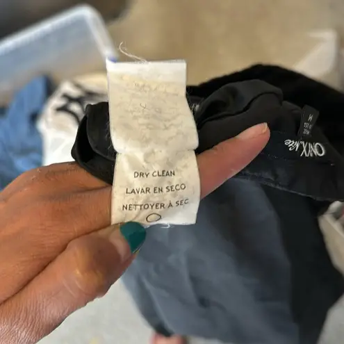 Onyx Nite Onyx a-line black light sheen lil bit of tulle under back zip skirt size M