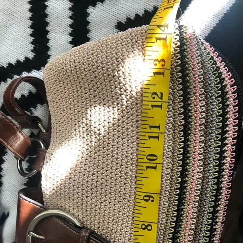 Cute 90s beige cream tan khaki crochet bag with a brown green pink stripes shoulder hand bag purse and buckle detail.