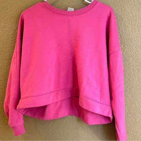 All In Motion  Lot-two cropped sweatshirts in size xs in both teal and hot pink