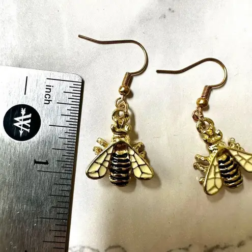 Gold tone and black bee earrings