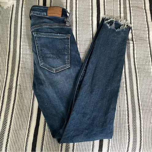 American Eagle  Next Level Stretch High Rise Jegging Crop Distressed Blue Jean 0