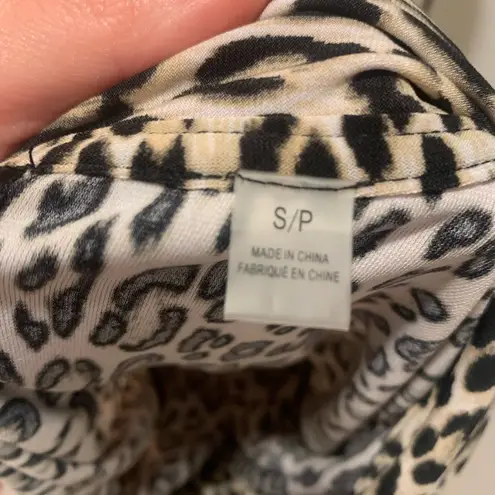 T Tahari  | Animal print wrap style shirt