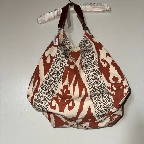 Elegant Brown and Cream Tote with Modern Details