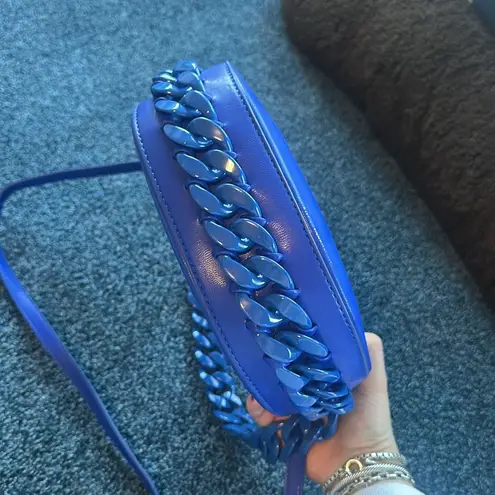 Blue purse with blue chain detailing