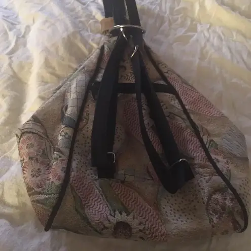 Danny K Beverly Hills country core tapestry triangle backpack in a beach scene