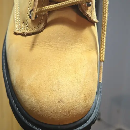 has a safety helmet Brand Acton. Tan Size 7