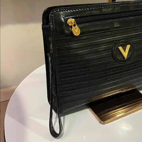 Mario Valentino Black Wristlet with Gold Details