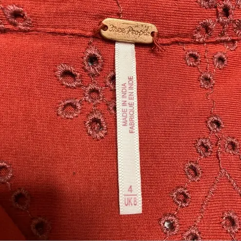 Free People  rust colored eyelet jumpsuit zip up size 4‎