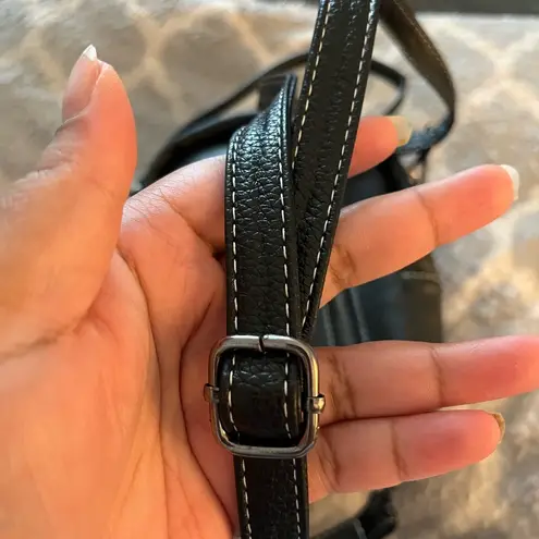 Sleek Black Leather Backpack with Adjustable Strap