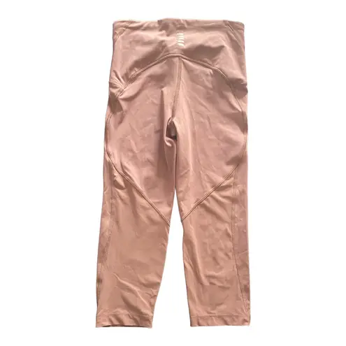 Under Armour -BLUSH COLOR LEGGINGS-SIZE XS Blush pink athletic leggings, has back pocket, drawstring waist, excellent condition  Measurements: Waist: side to side 12-14 inches  Inseam: 17 inches