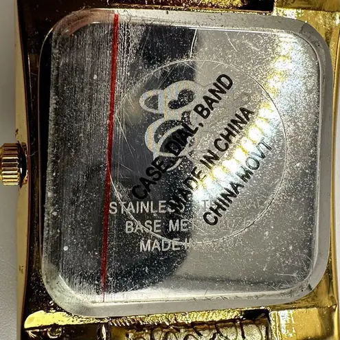 Vintage Elizabeth Taylor gold tone rhinestone watch