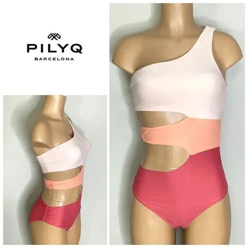 PilyQ New.  peach/pink cut out one piece. Medium   Retails $144