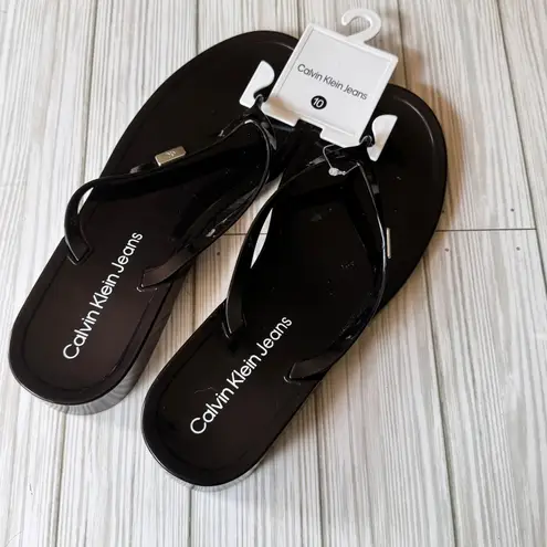 Calvin Klein Jeans Women's Black and Clear Logo Flip Flops Sz 10