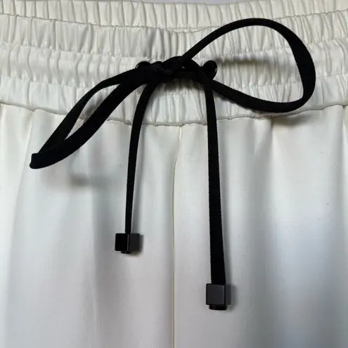 Koral Activewear metallic bead embellished egret vanilla scuba sweatpants pants