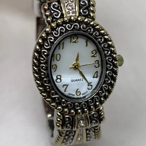 Women silver gold tone cuff bangle bracelet watch 25mm oval mop 7.5” running