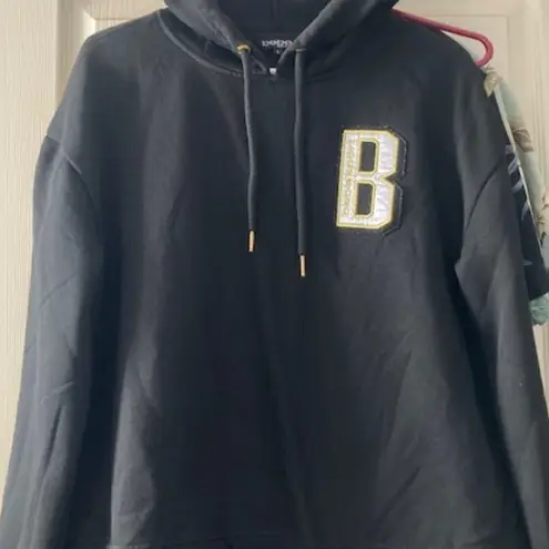 Bebe  hoodie black with gold size L