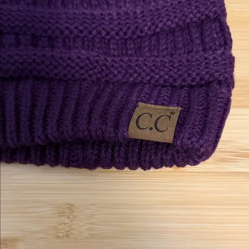 C.C BeanieTail Soft Stretch Cable Knit Messy High Bun Ponytail Beanie in Purple