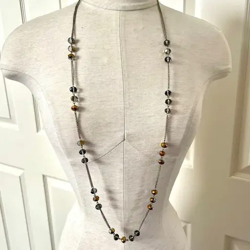 Long silver tone crystal necklace