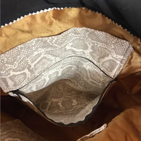 Handmade  Boho purse/tote bag featuring mixed materials and embellishments