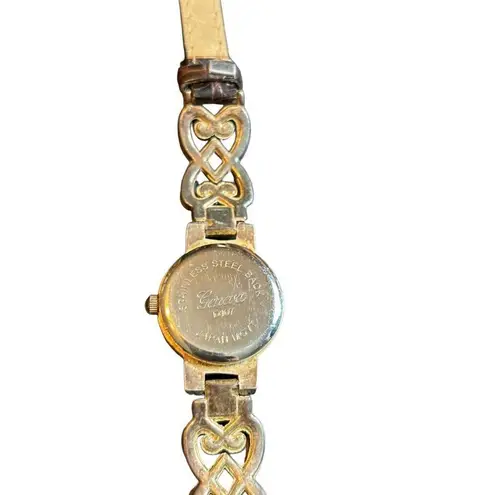 Vintage Geneva Women's Gold Watch With Intricate Band