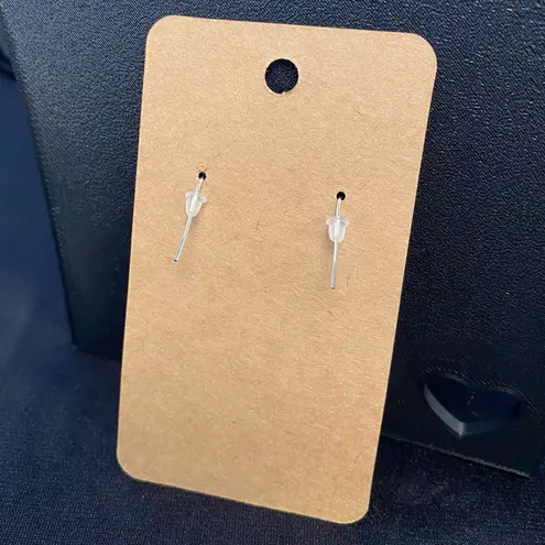 Don’t want to wear an ugly sweater on your torso? Wear some on your ears instead Blue