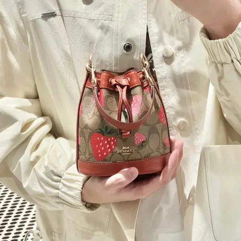 Coach  Mini Dempsey Bucket Bag In Signature Canvas With Wild Strawberry CH164