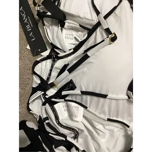 La Blanca New. polka dot plunge neck swimsuit. MSRP $139. Size 14