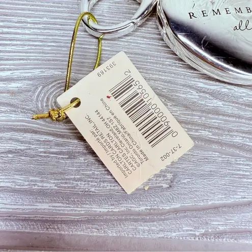 Vintage Carlson heart “ the heart remembers all “ silver 2 sided locket keychain