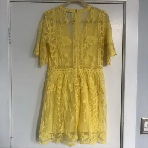 Socialite bright yellow lace mini dress short lined sheer back v neck floral