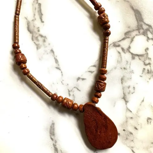 Peruvian wood beaded pendant necklace Brown